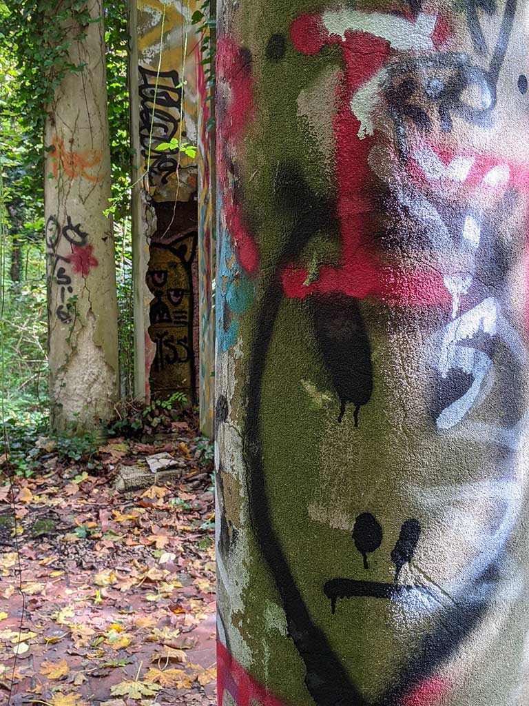 image of graffiti on a gazebo pillar