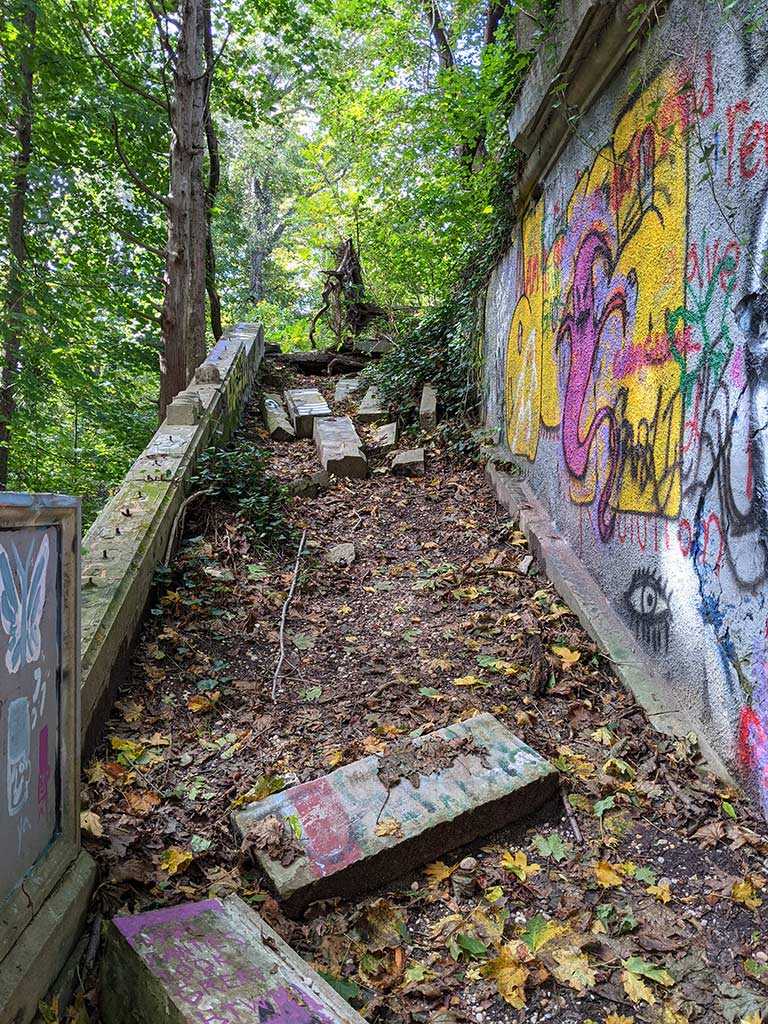 image of the left staircase wall covered in graffiti