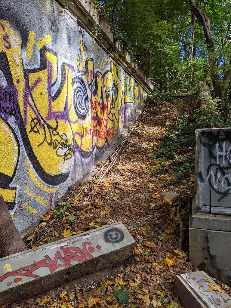 image of the right staircase wall covered in graffiti