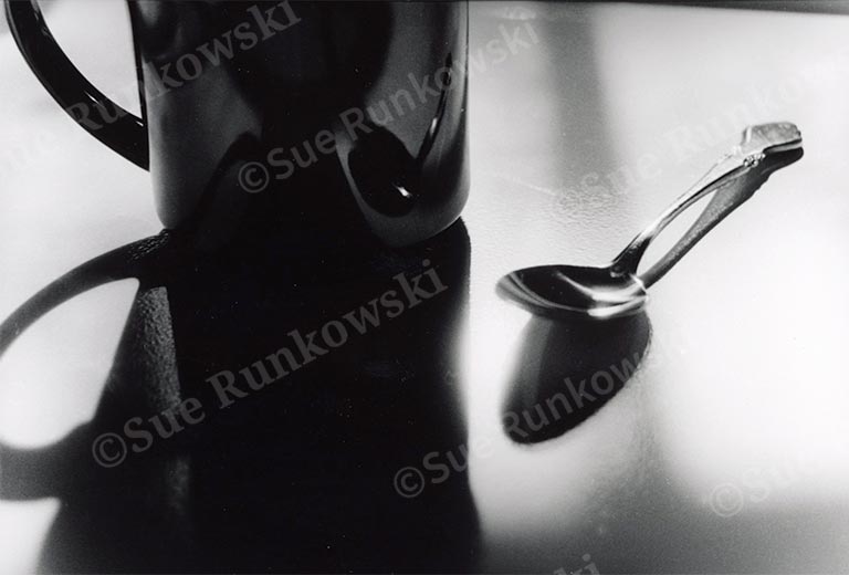 image a a coffee mug and spoon