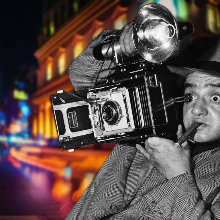 image of Arthur Fellig, aka Weegee, with field camera