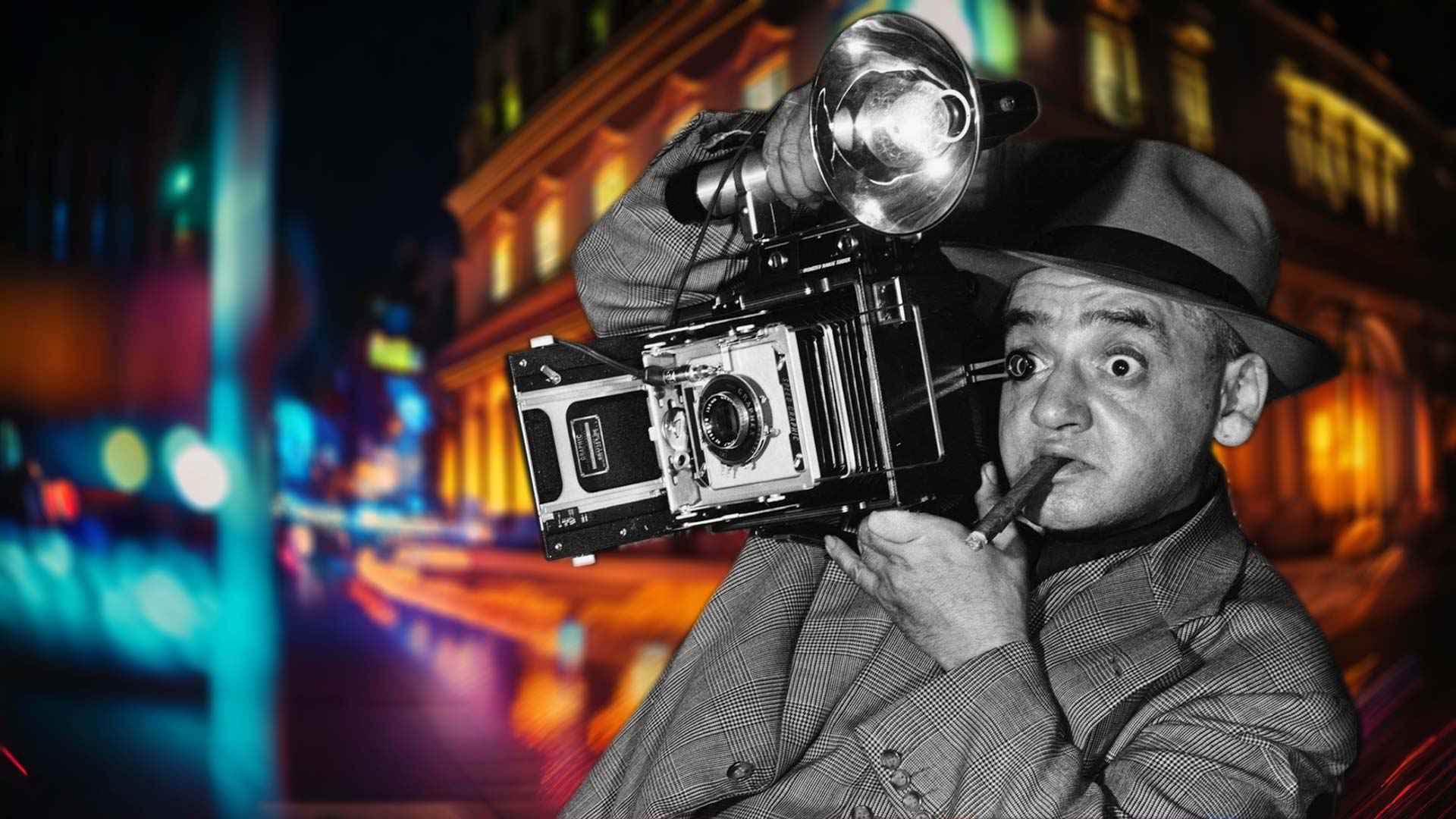 image of Arthur Fellig, aka Weegee, with field camera